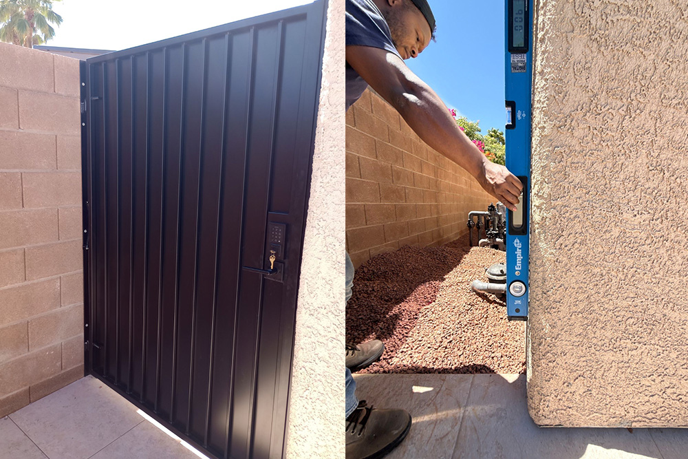 Worker’s hand uses a blue level against a stucco wall to align a metal gate.